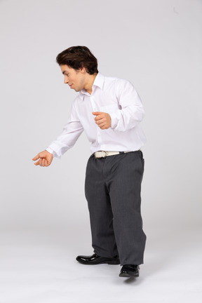 Man looking and bending down