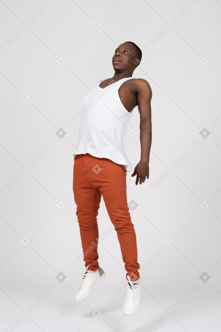 Young man levitating
