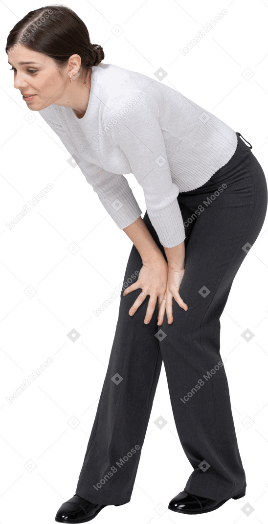 Front view of a woman bending down