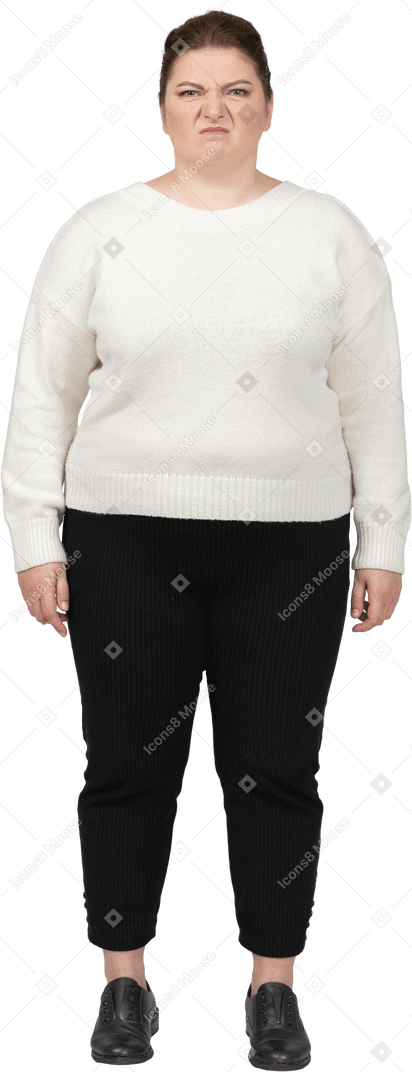 Plump woman in casual clothes making faces