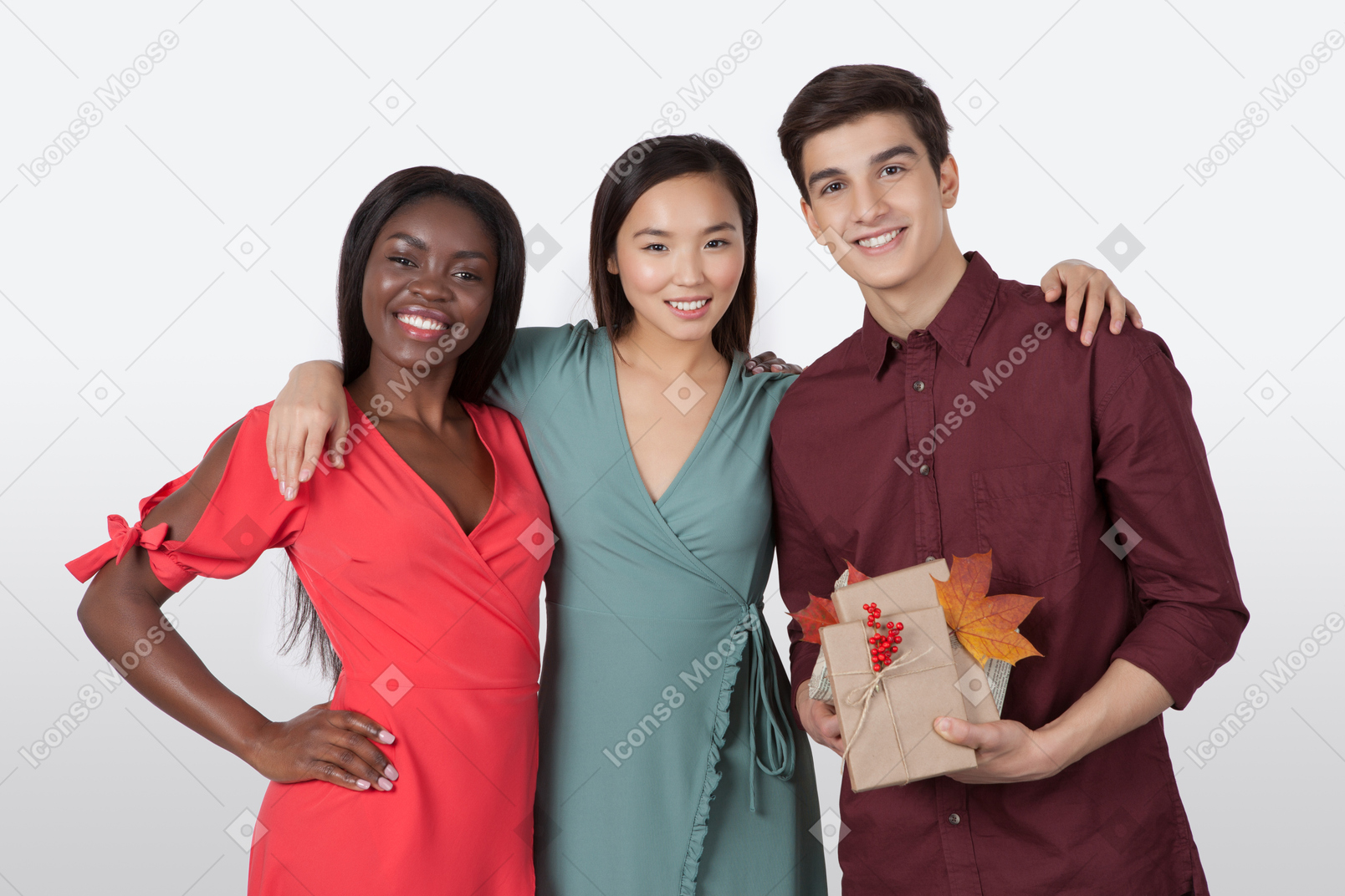 Bunch of friends hugging each other and holding present