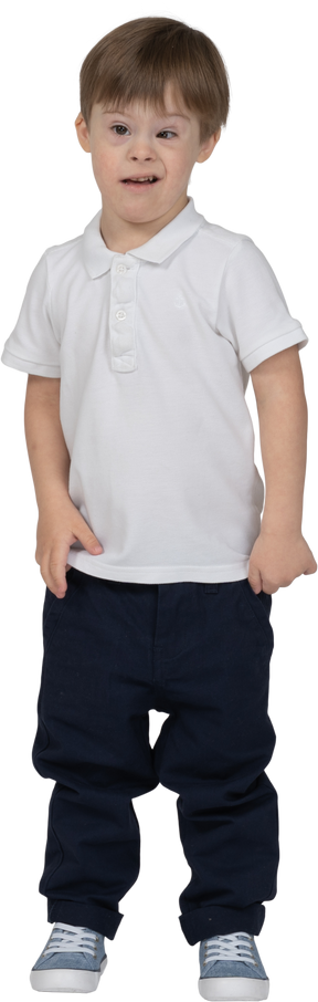 Front view of a boy standing and looking puzzled