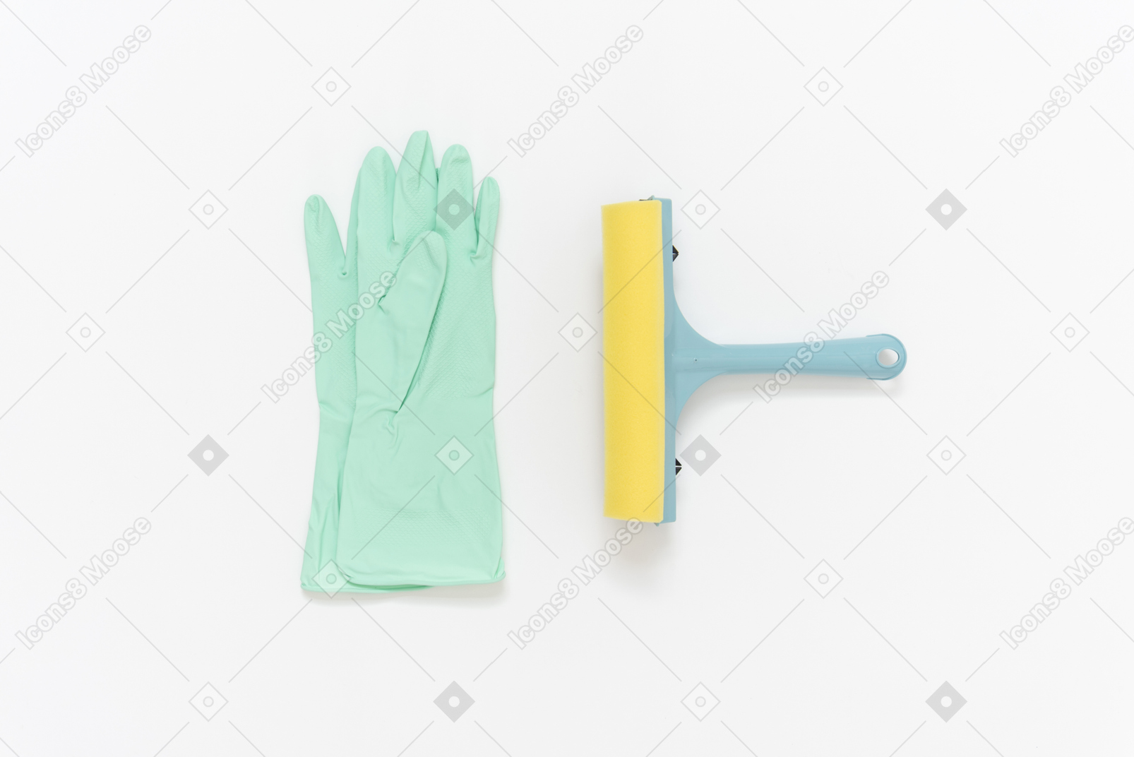 Rubber gloves and a glass wiper lying near each other on the plain white background