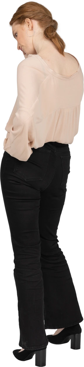 Woman in beautiful blouse standing
