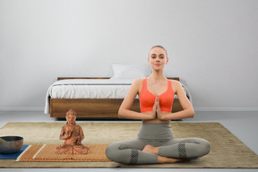 Beautiful young woman meditating