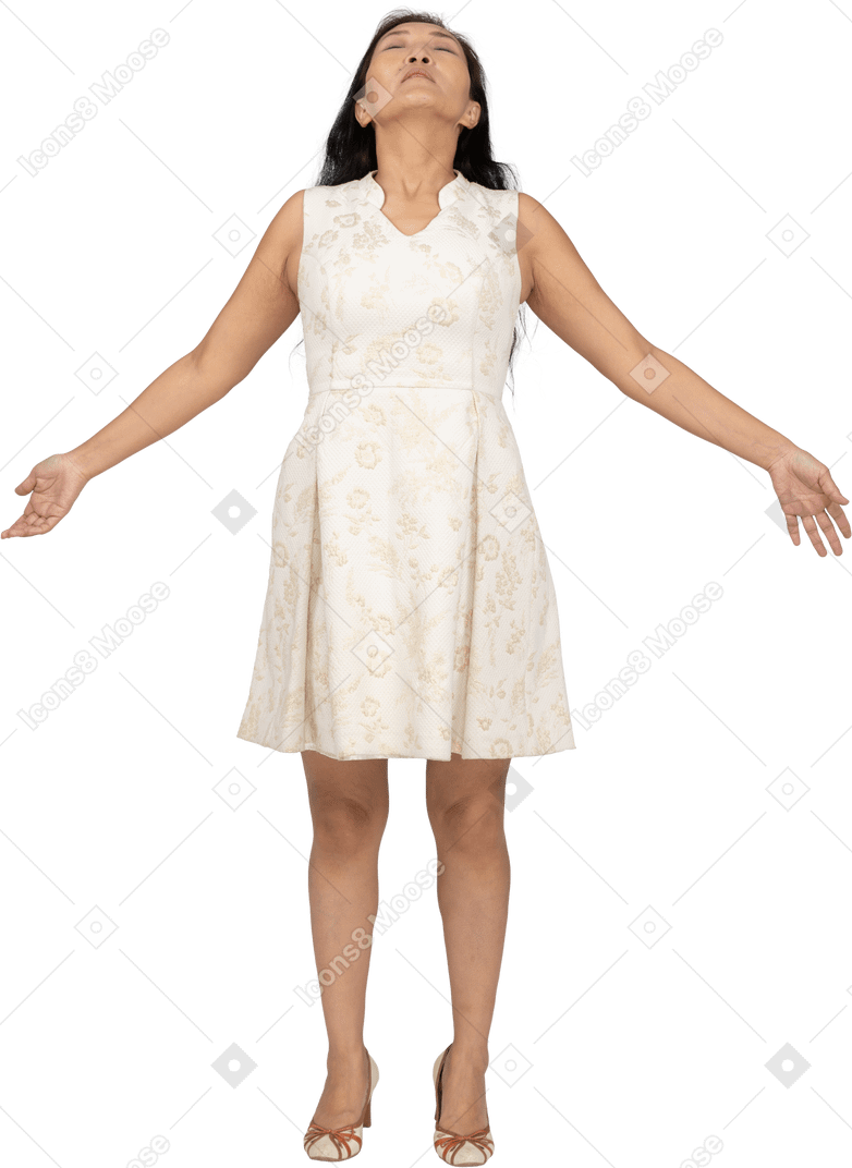 Woman in beautiful dress jumping