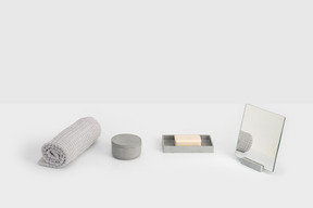 Bath accessories on grey backgroung