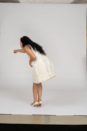 Woman in a white dress standing