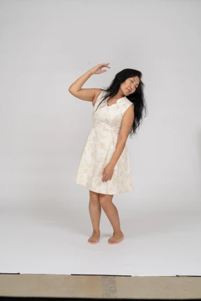 Woman in beautiful dress standing