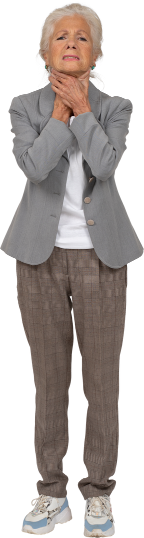 Front view of an old lady in suit chocking herself