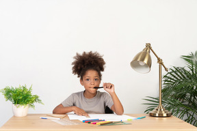 Cute girl doing homework