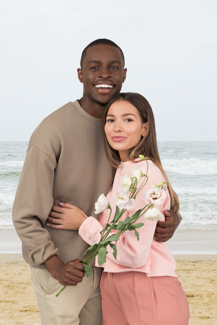 Person and groom on the beach