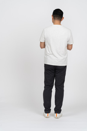 Back view of a man in casual clothes