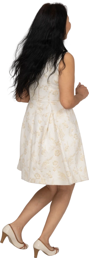 Woman in beautiful dress dancing