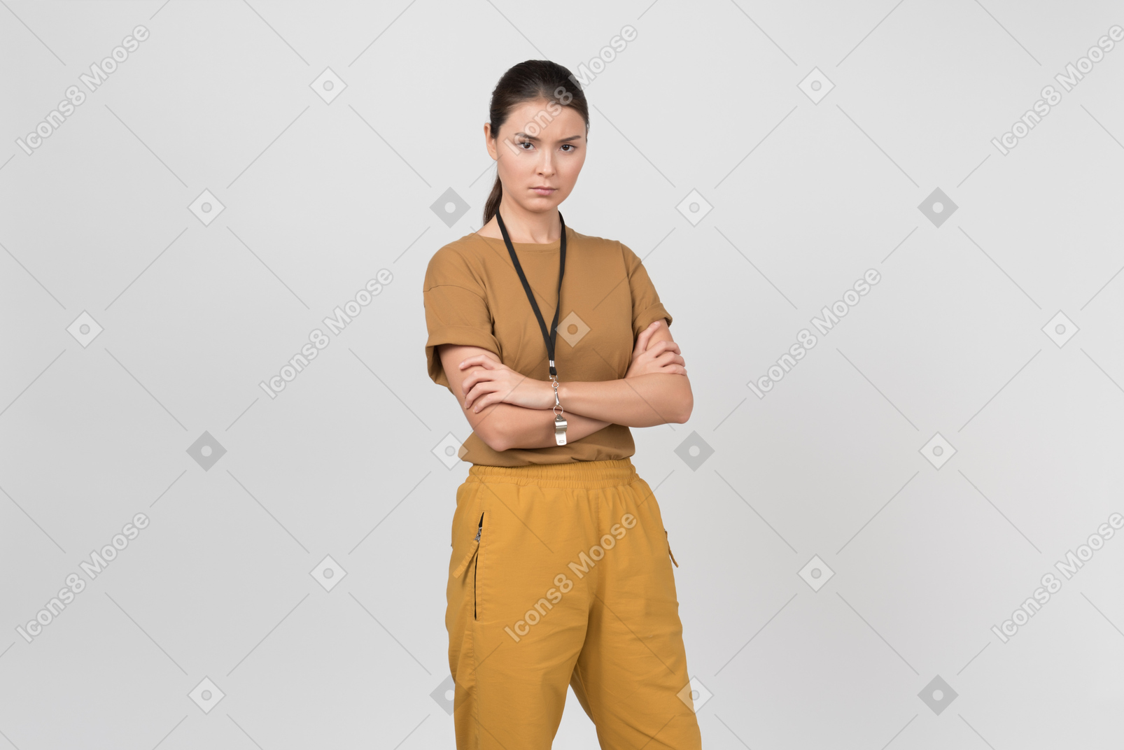 Pe female teacher standing with her hands crossed