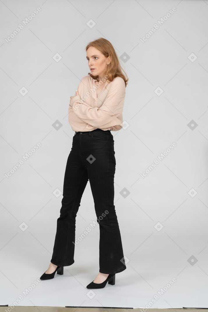 Woman in beautiful blouse standing