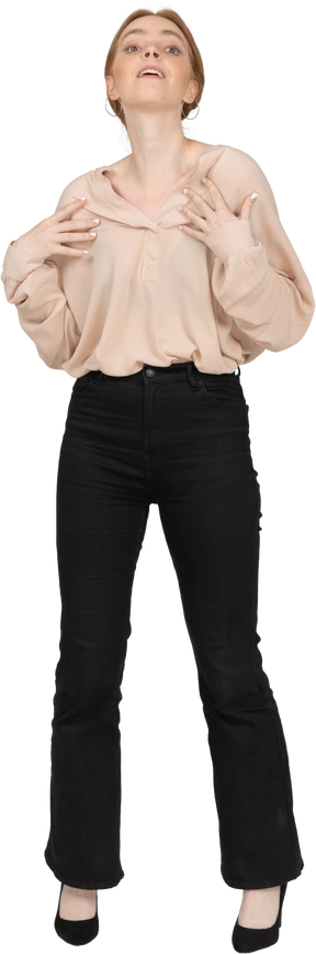 Woman in beautiful blouse standing