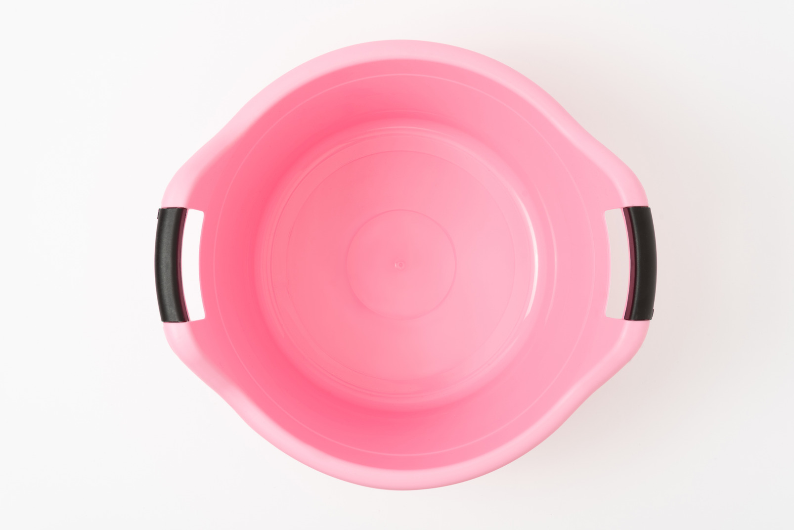 Pink round plastic wash basin