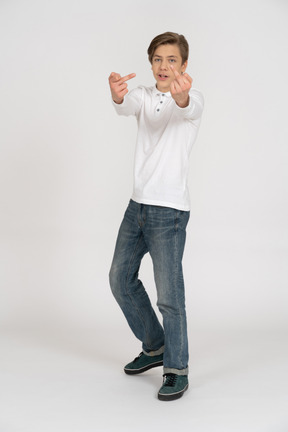 Young man in casual clothes standing