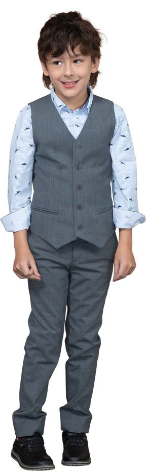 Front view of a happy boy in suit