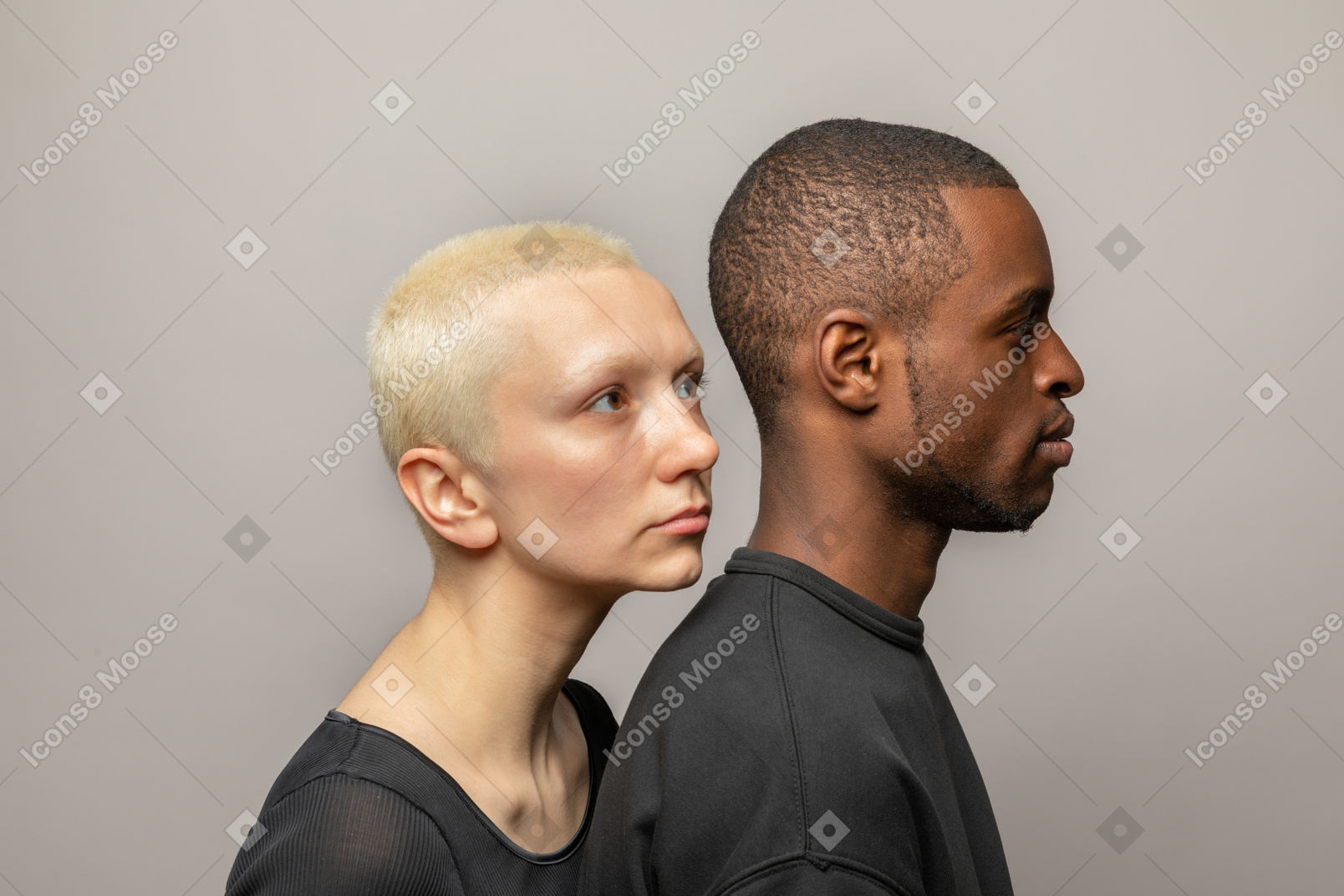 International couple standing close