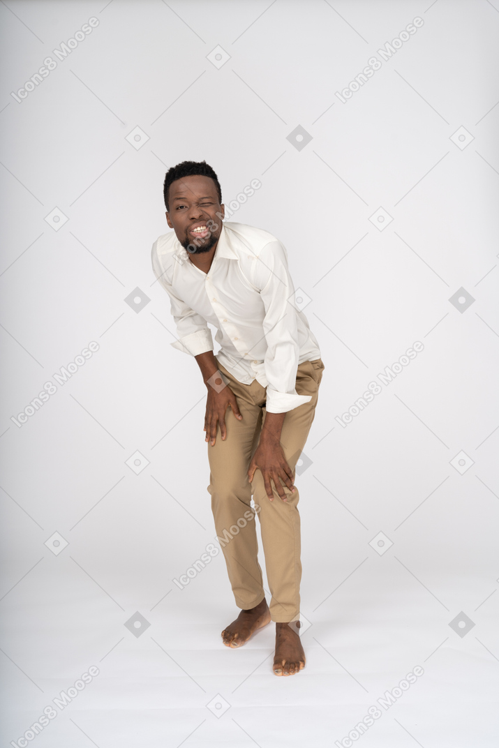 Man in white shirt standing