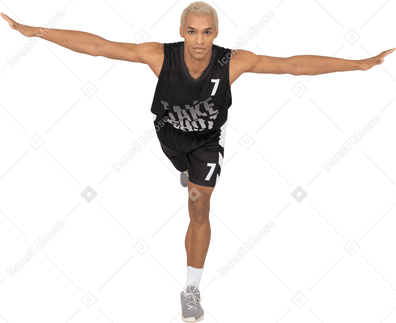 Front view of a balancing young male basketball player leaning forward & standing on one leg