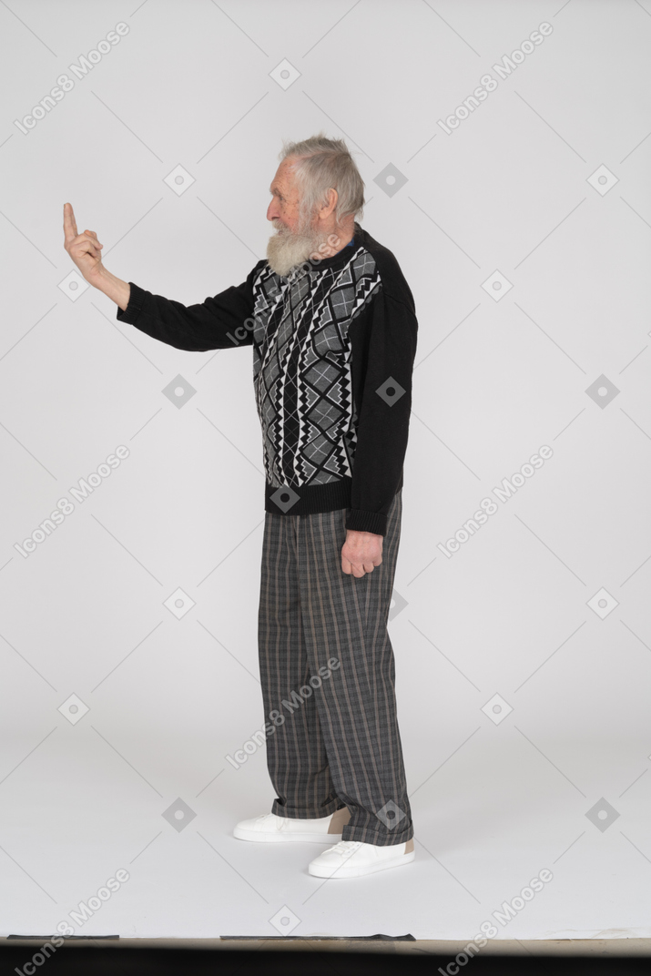 Side view of old man showing two fingers