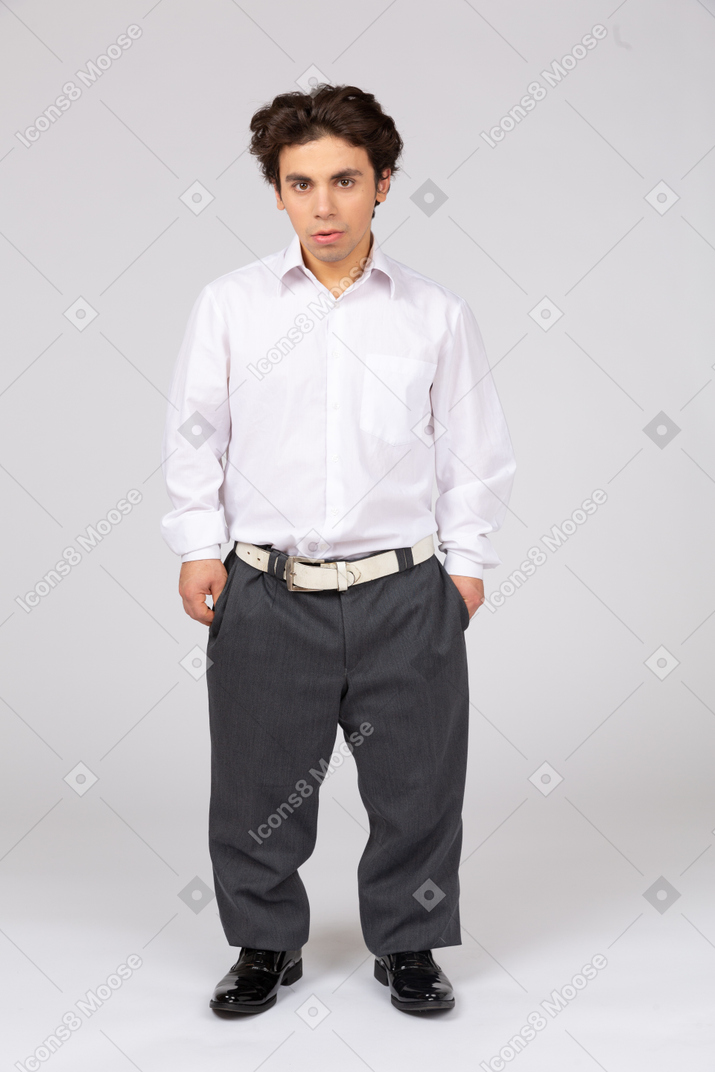 Front view of a serious-looking man in business casual clothes