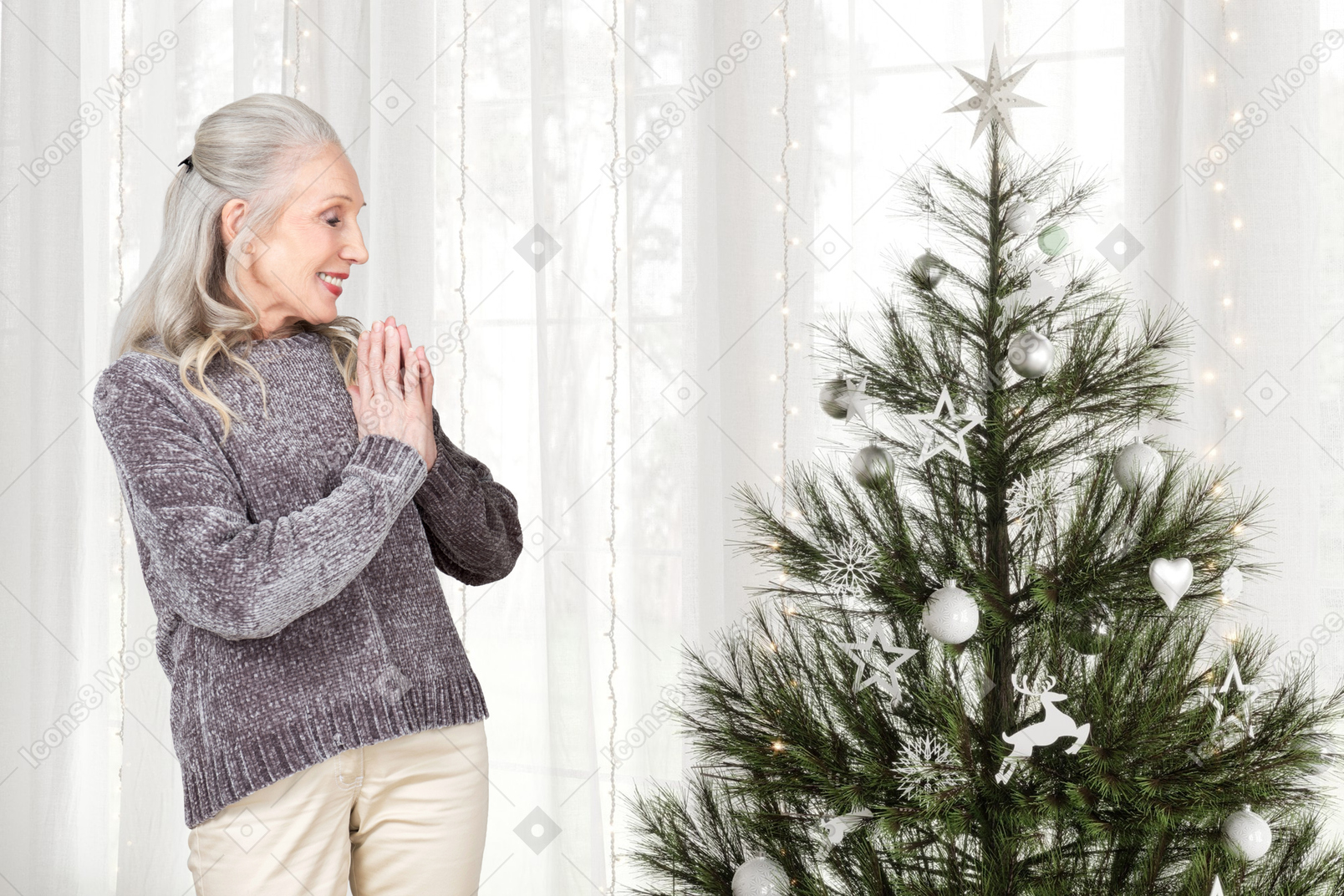 Senior woman happy to see decorated christmas tree