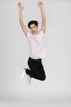 Man in casual clothes jumping