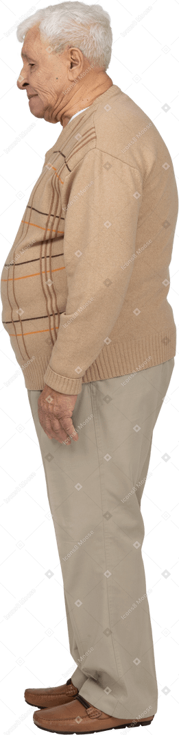 Side view of a sad old man in casual clothes