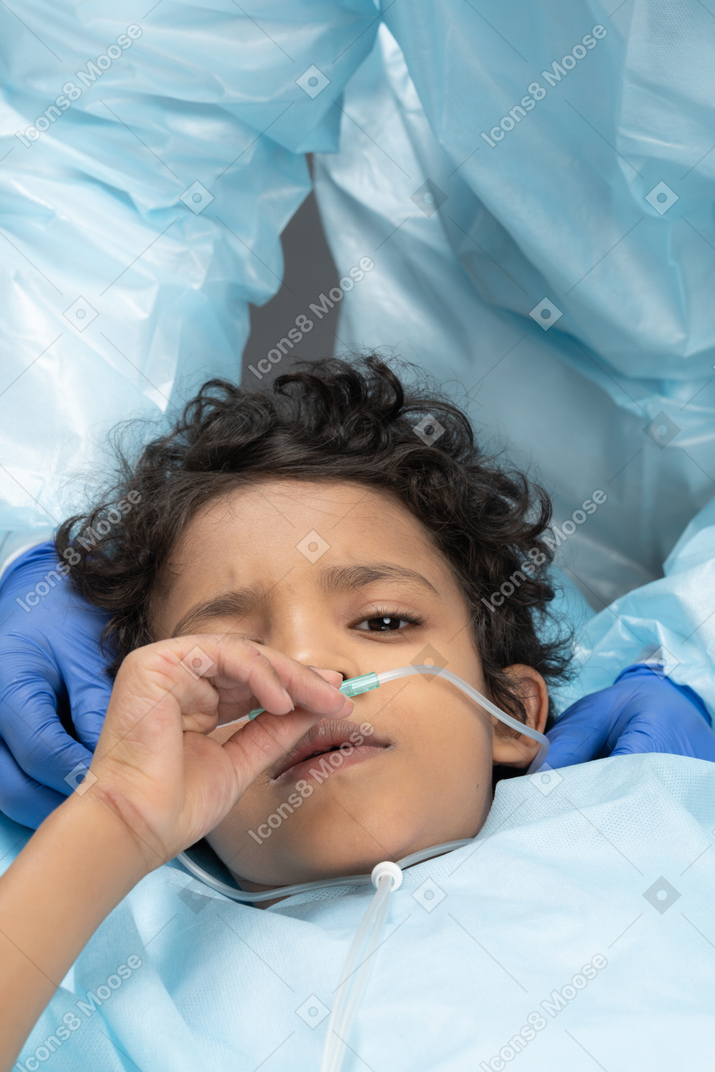 Child with nasal cannula