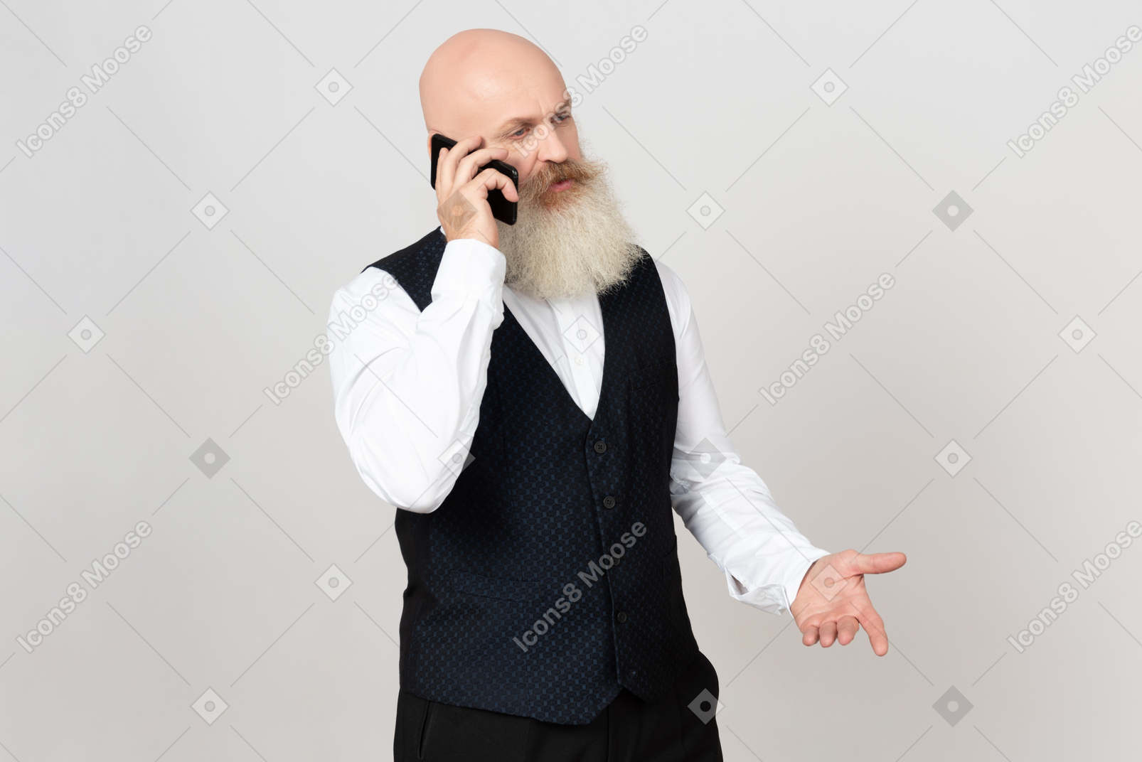 Aged man looks totally involved in phone talk