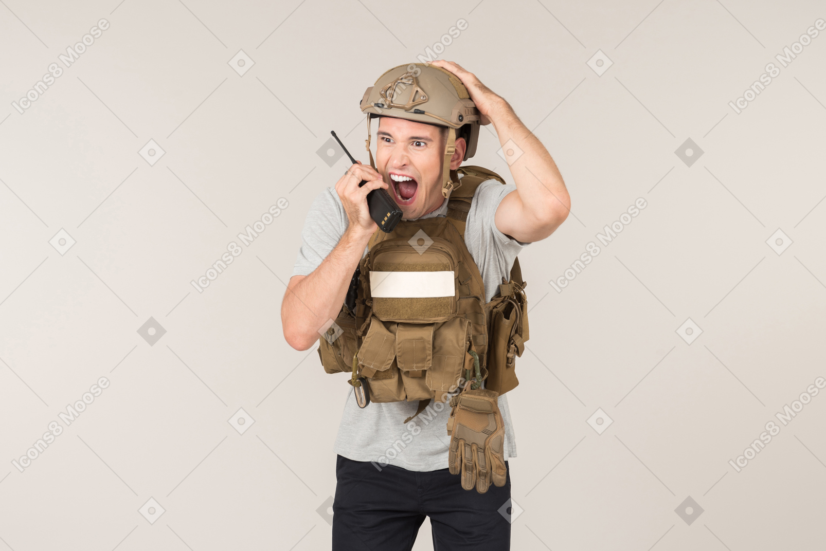 Male hot zone reporter in bulletproof vest yelling in radio phone