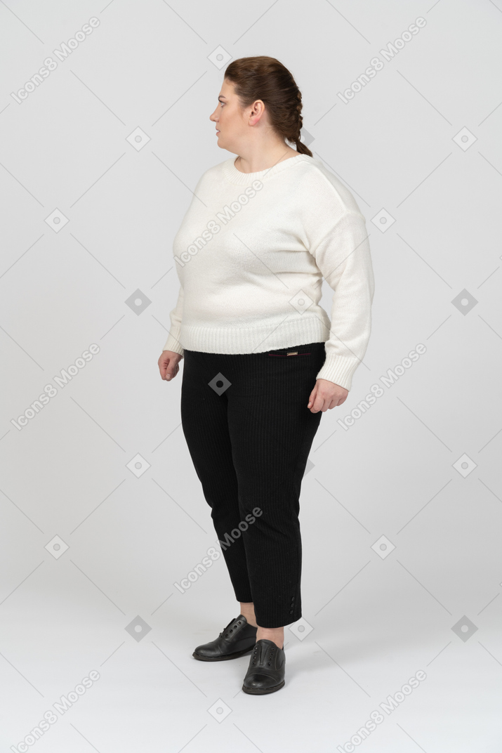Scared plump woman in casual clothes