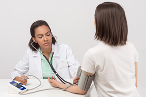 Concentrated on patient's examination