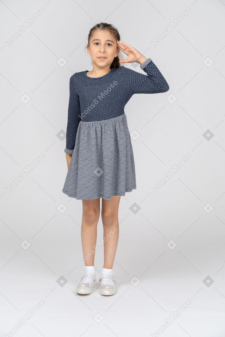 Front view of a girl saluting