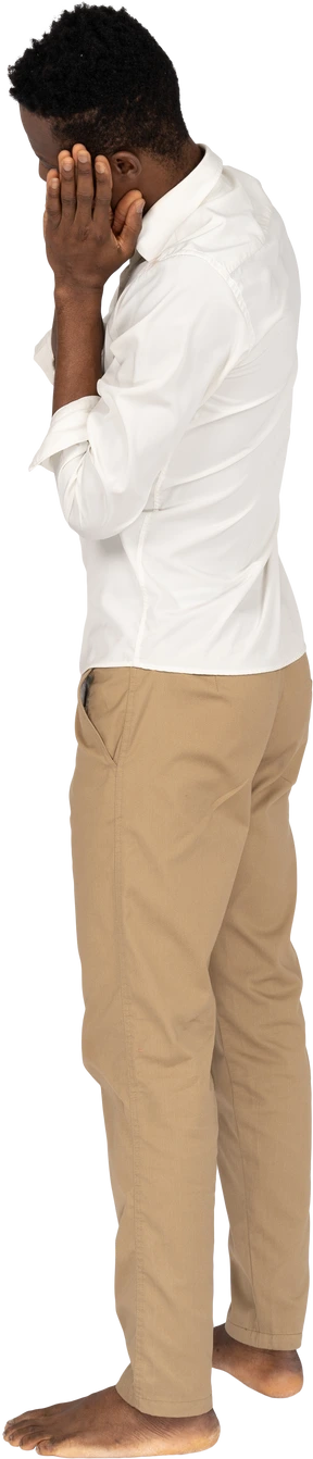 Man in white shirt standing