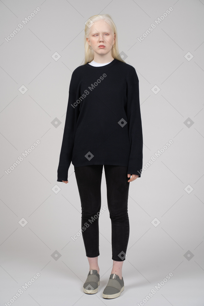 Standing woman in black clothes