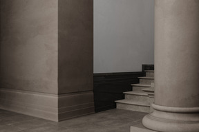 Brown interior with stairs and column