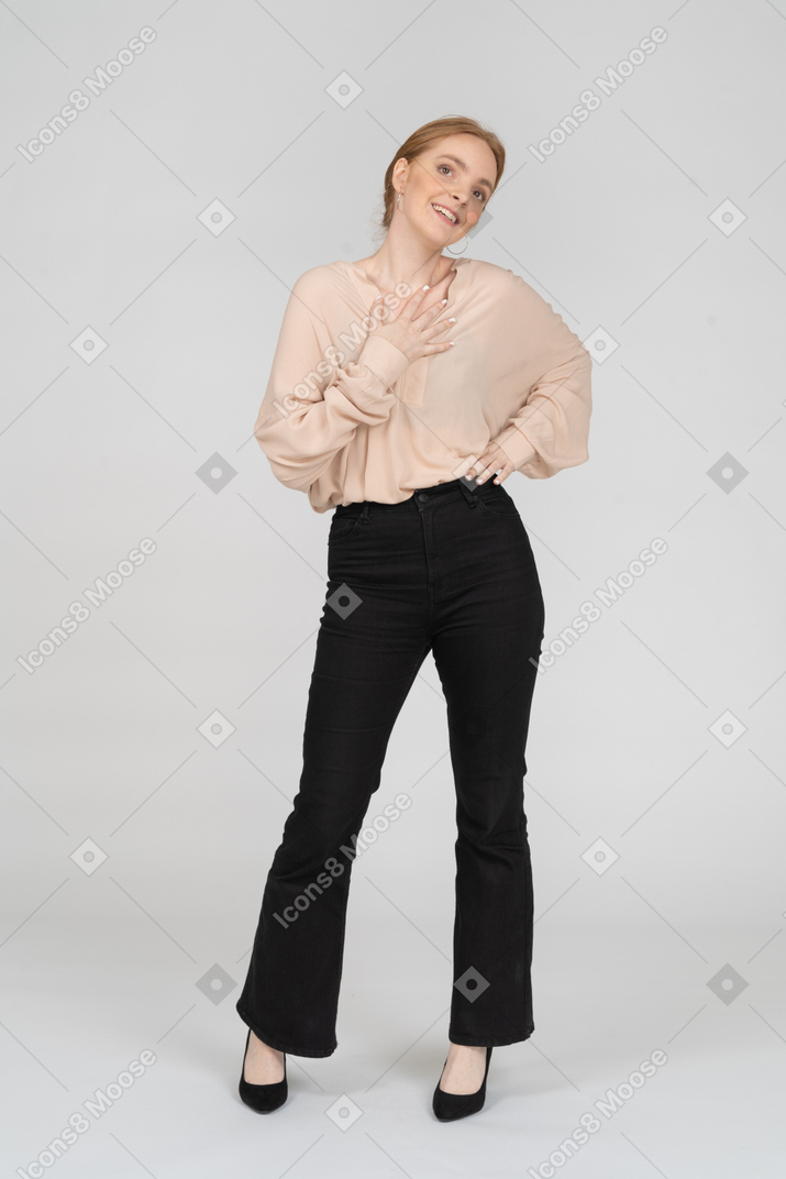 Woman in beautiful blouse standing