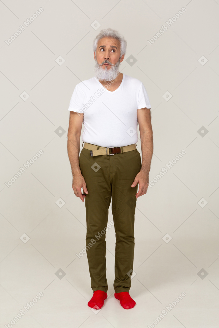 Front view of a nervous man in casual clothes