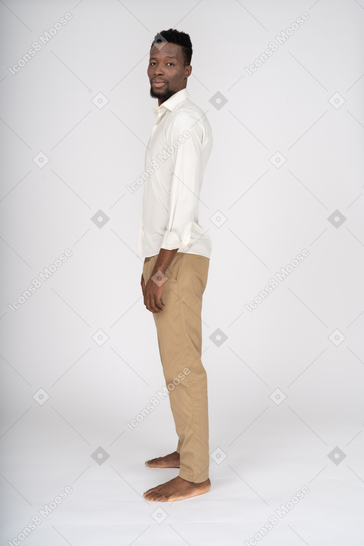 Man in white shirt standing