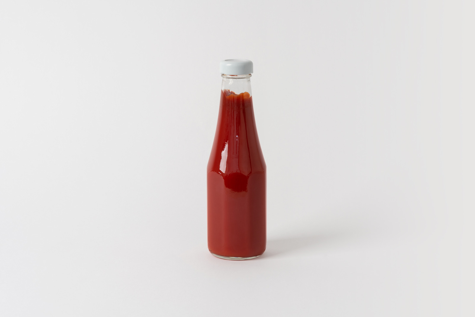 Tomato sauce in a glass bottle