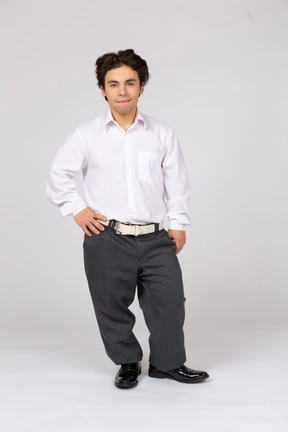 Man standing and biting lip