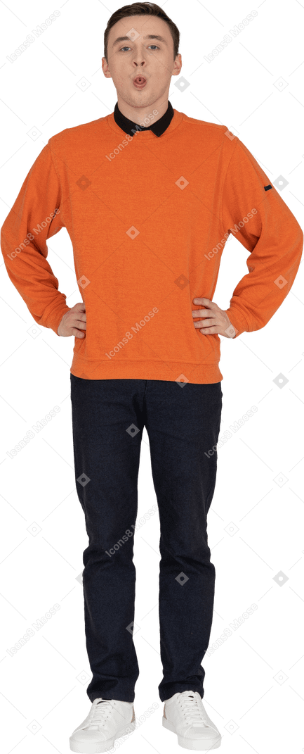 Young man in orange sweatshirt standing