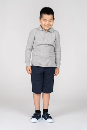 Smiling boy looking down