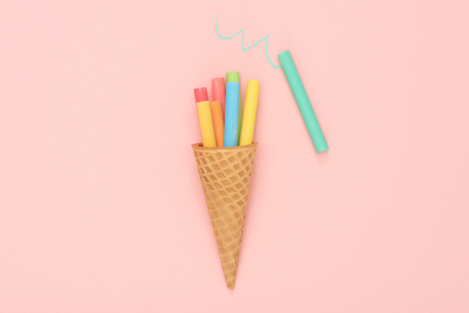 Ice cream wafer cone with colorful crayons