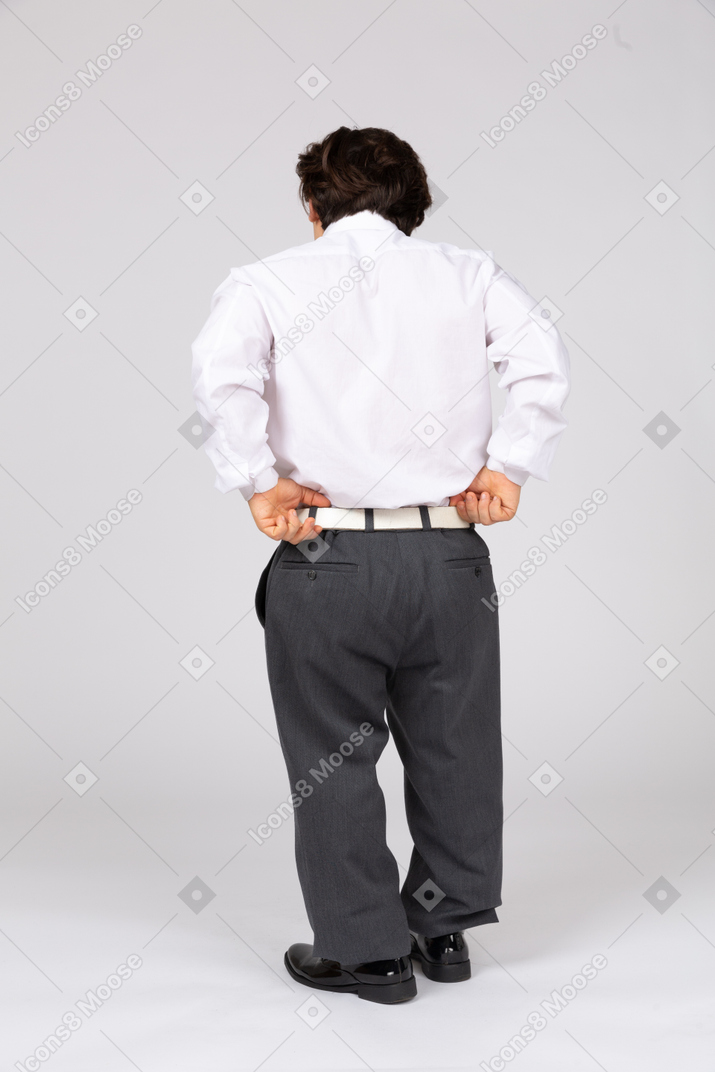 Man pulling up trousers